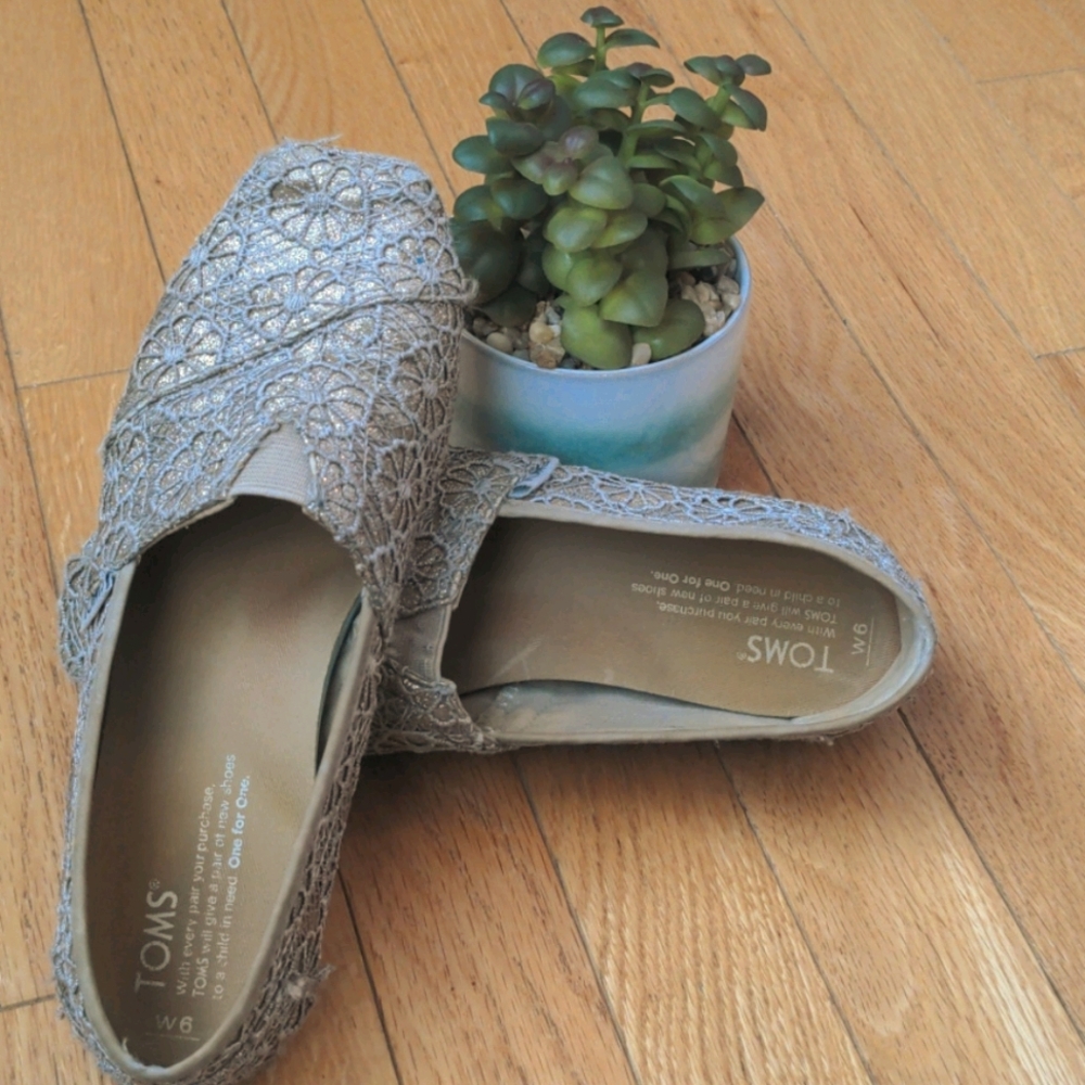 Toms Gold Glittery slip ons! Women's size 6